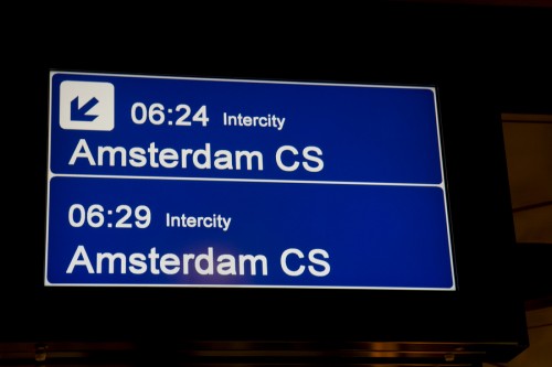 Look for a train that goes to Amsterdam Centraal (Amsterdam CS).